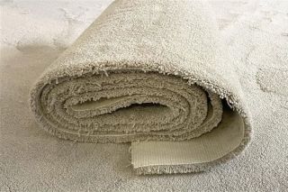 roll of cream carpet offcuts